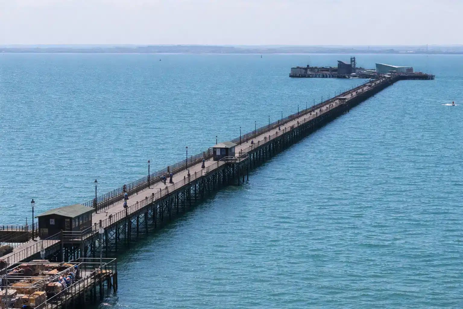 Southend Pier stretching out across the estuary on a bright day