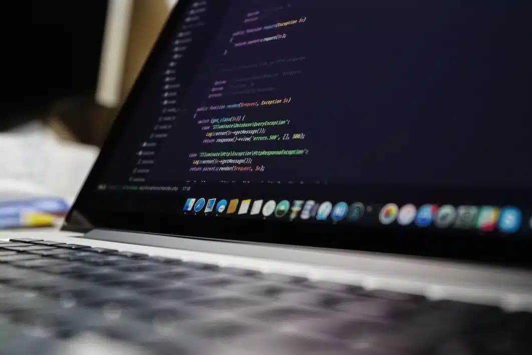 Laptop showing a code editor interface