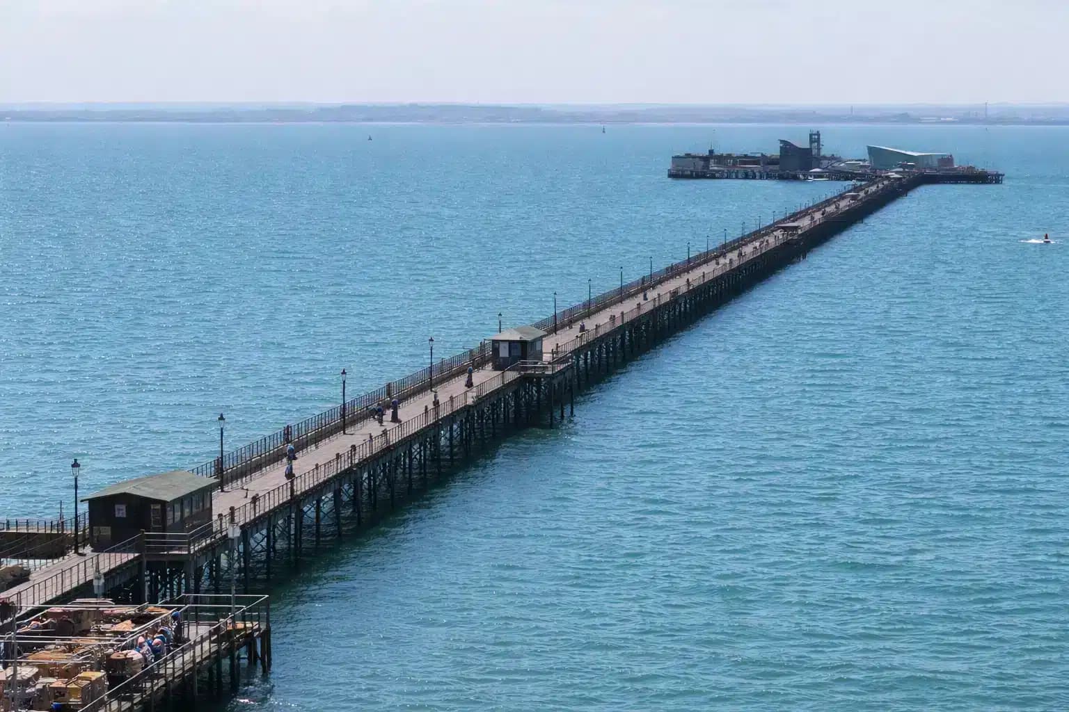 Southend Pier stretching out across the estuary on a bright day